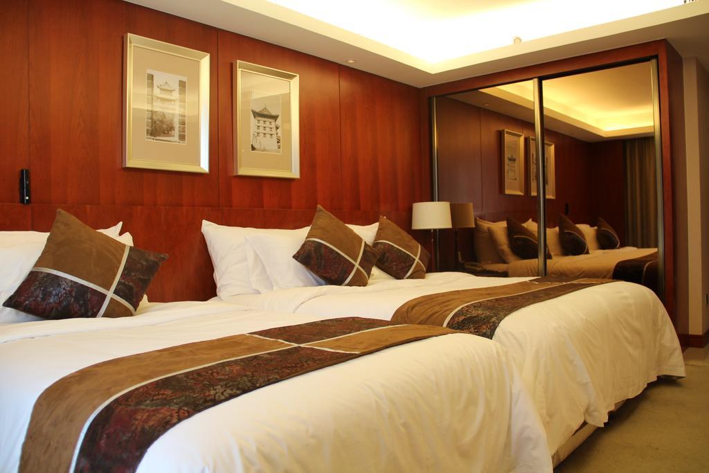 Xi'An Qu Jiang Yin Zuo Hotel Стая снимка