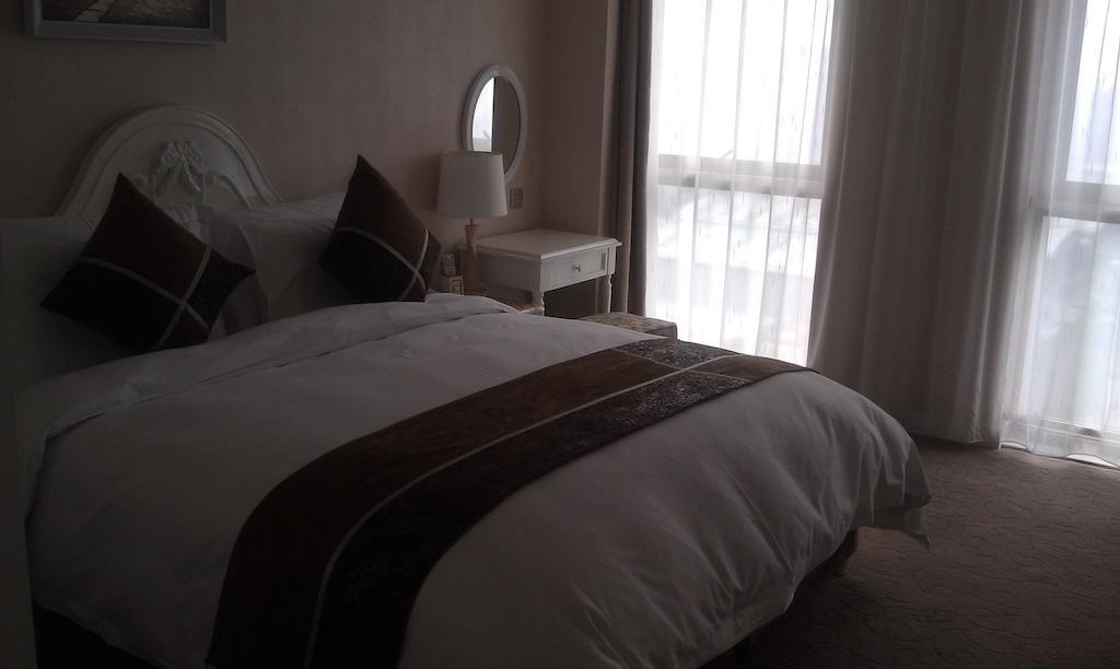 Xi'An Qu Jiang Yin Zuo Hotel Екстериор снимка